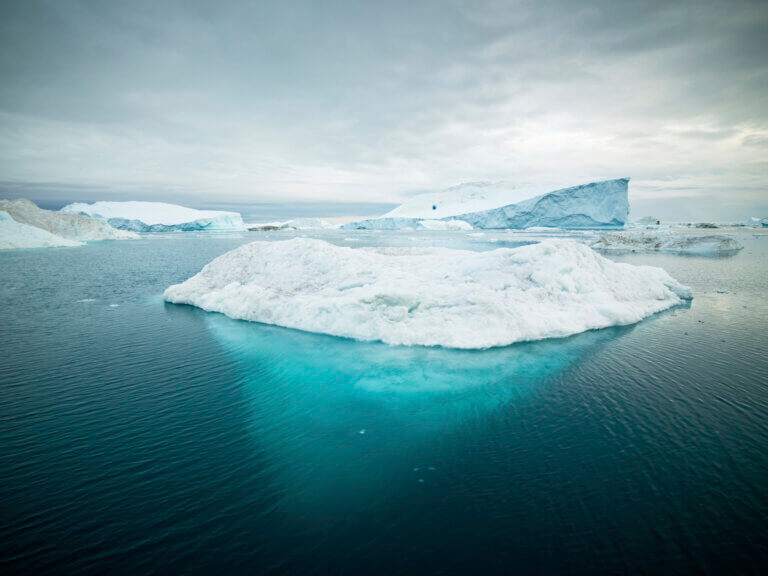 Arctic Icebergs in the clean arctic sea.