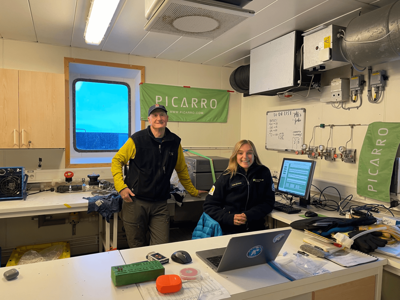 Welker & De Ouden in their Neptune (conDnuous sea water isotope measuring device) laboratory
